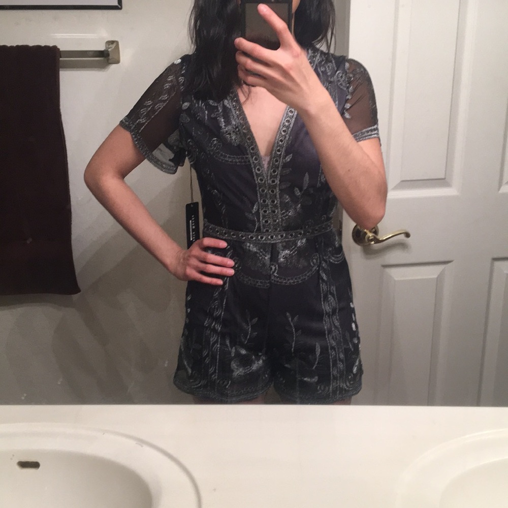 Sweet and Sexy!—Low-cut, silver embroidered romper